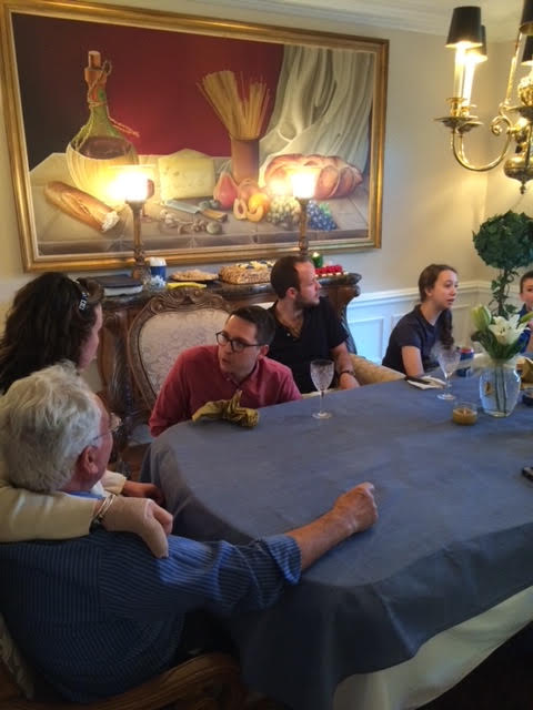 Salpietro’s parents commissioned this painting for their restaurant, where it hung for years. It now has a place of honor in Salpietro’s home where a family gathering included (l-r) his father, Vincent; his sister, Mary Grace; his son-in-law, Shawn, and his son, Francesco; and his daughter, Isabella.