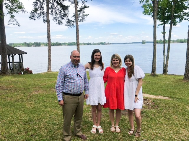 Christian Stegmaier, his wife Paige and their two daughters, Ella, 17, and Grace, 19, at Paige’s family’s homeplace on Lake Murray in South Carolina.