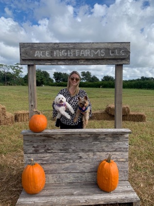 Heather visits a local pumpkin patch with her beloved dogs, Lulu and Toby, with whom she enjoys spending as much time as possible.