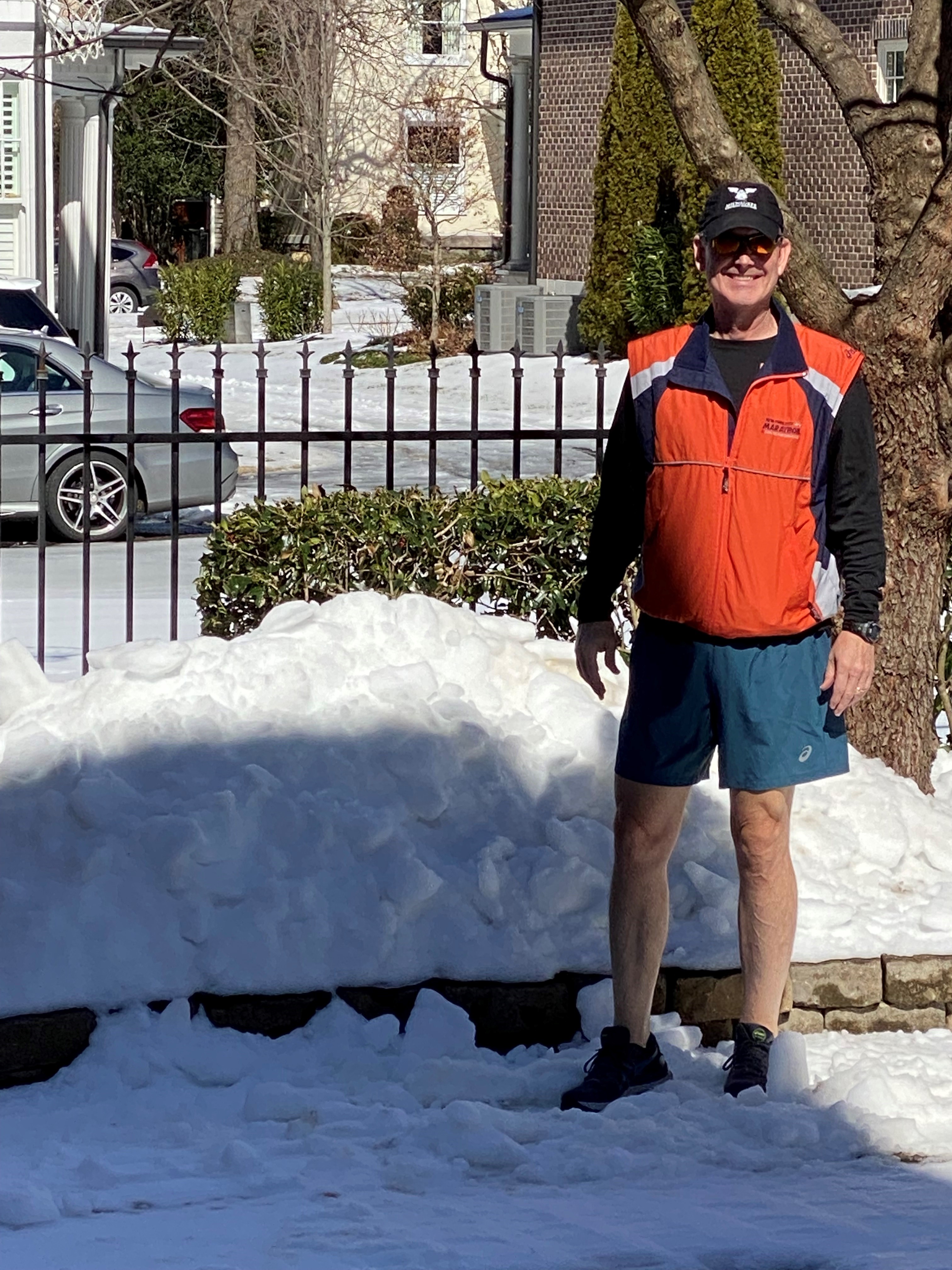 An avid long-distance runner, Marc Dedman is pictured about to set out on a 10-mile trek through snow-lined streets.