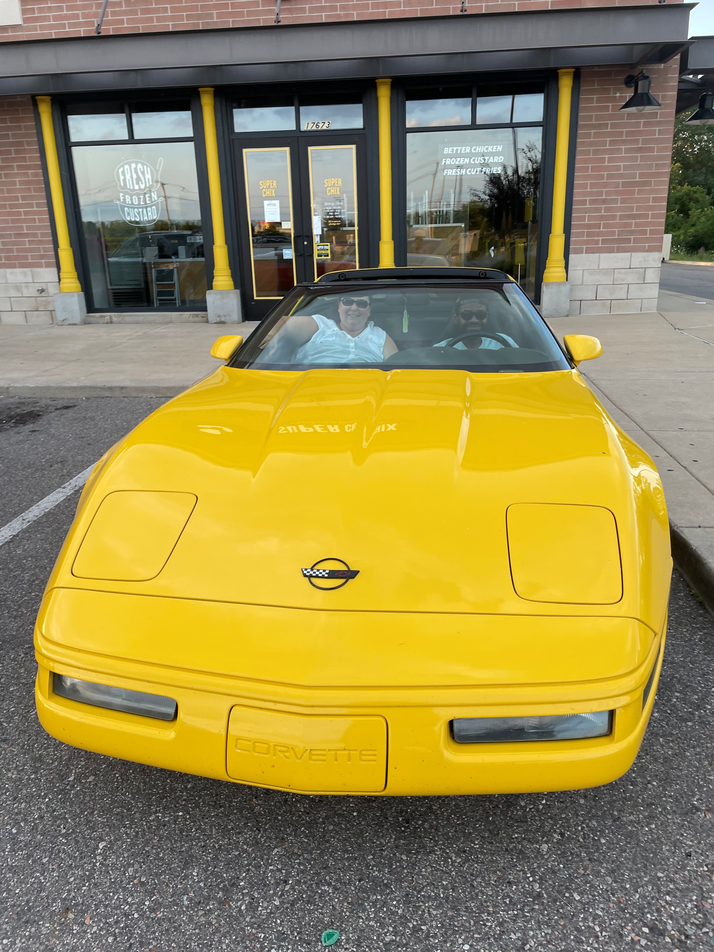 Rachelle inherited her family’s love for classic automobiles. She and her husband now own a 1996 yellow Corvette.