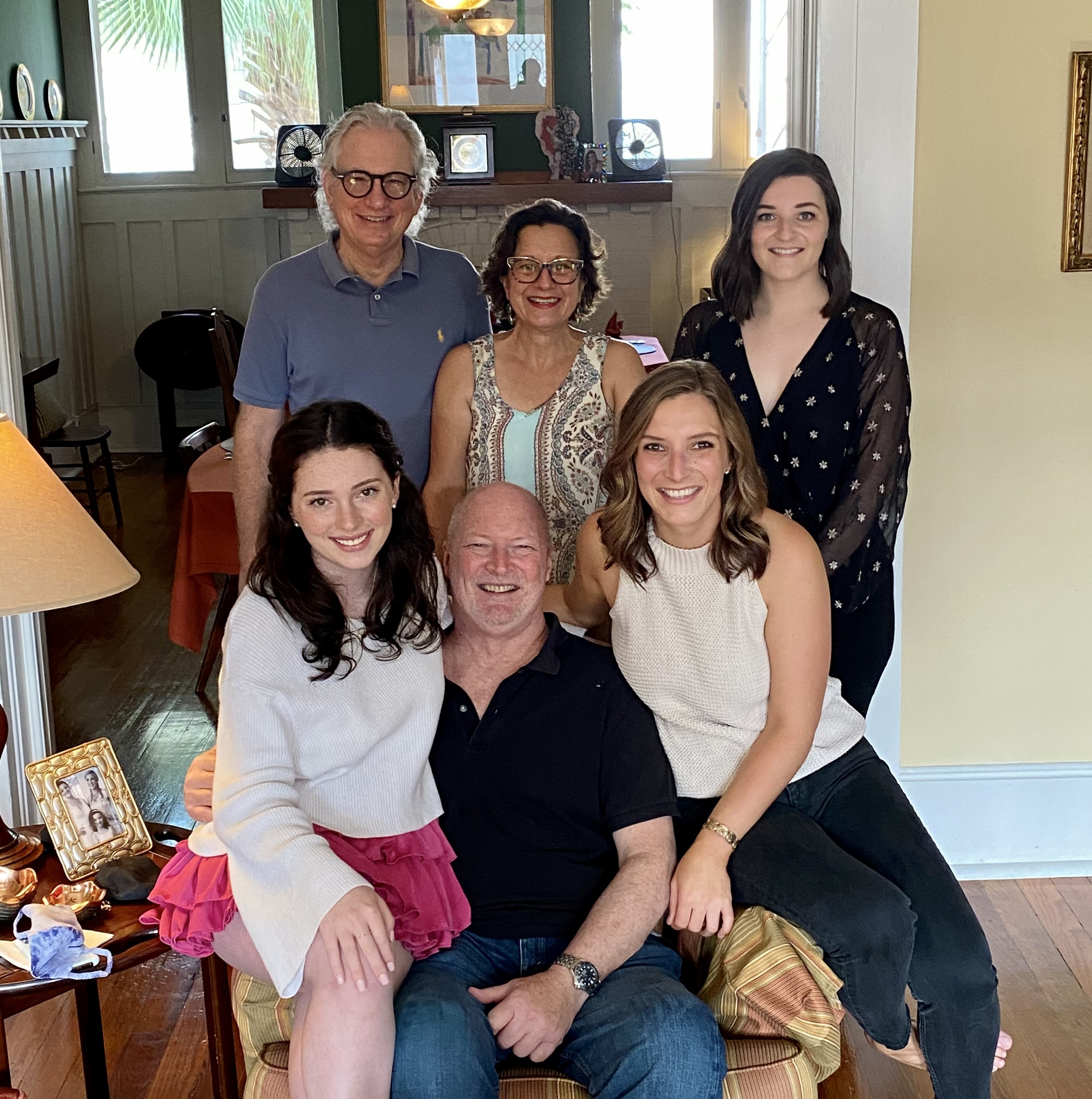 Marianna's family is close-knit and gets together as often as possible. Pictured at a Thanksgiving gathering are (front, l-r) sister Samantha Knister, father Terry Knister, and Marianna; (back) stepfather Kevin McGill, mother Angie Lamoli Silvestry, and sister Angelina Knister.