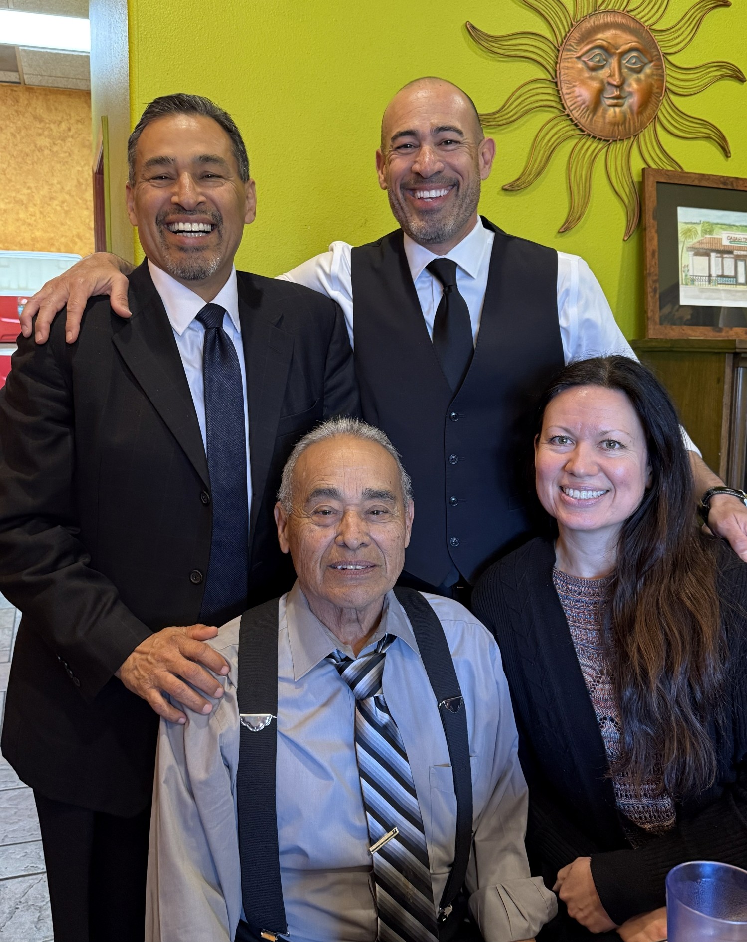 San Diego attorney Michael Pérez with his brother, Jon, his father, Ralph, and his wife, Beckie.