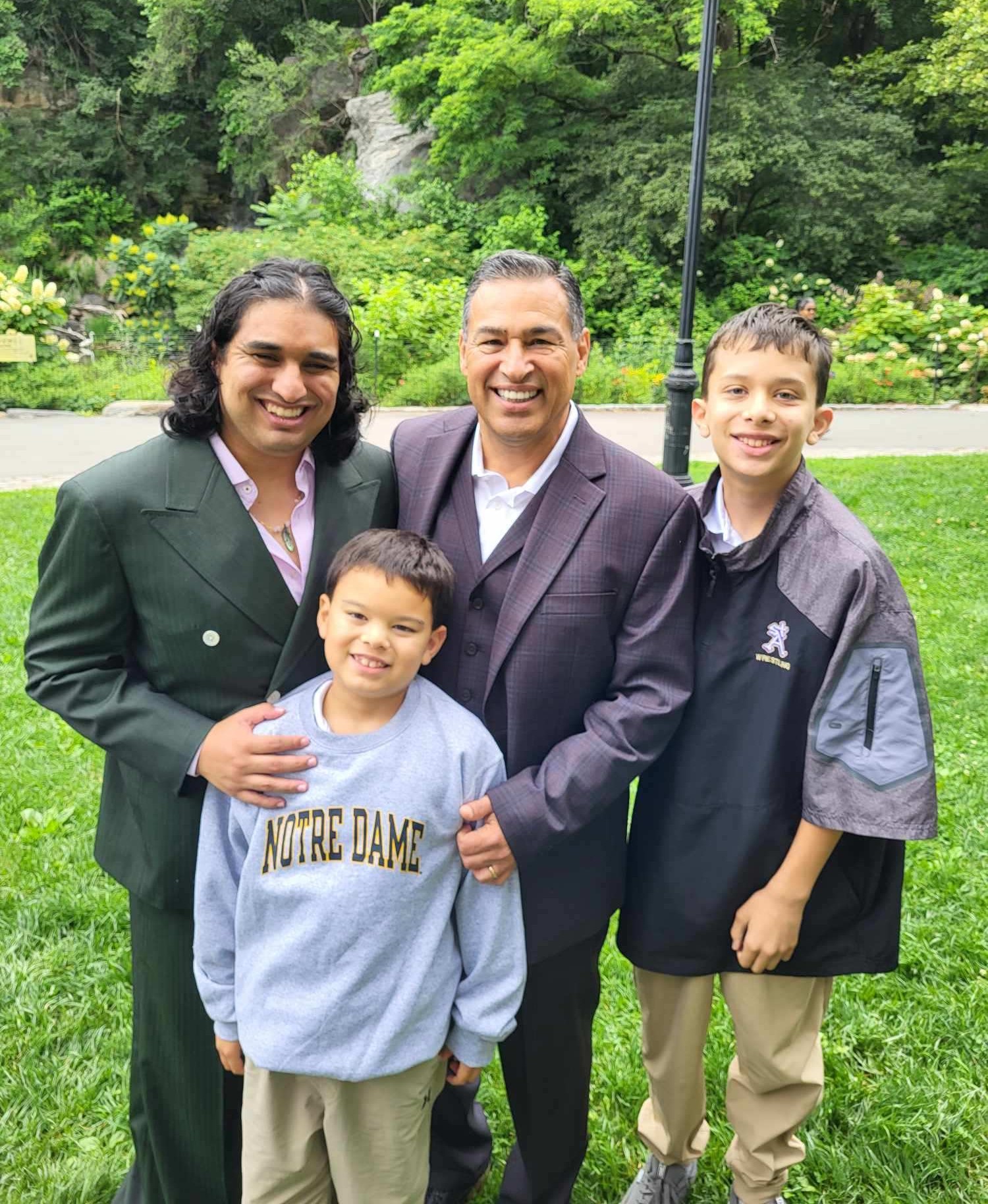 Attorney Michael Pérez and his three sons: (l-r) Tony, Michael, and Ezekiel attending Tony's wedding in June.