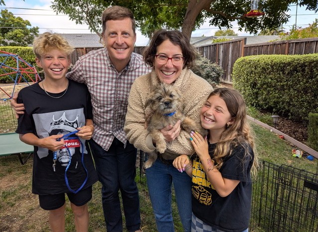 Travis with his wife, Nina, and their two children, Jesse and Elinor. Travis and Nina met while they were clerking.