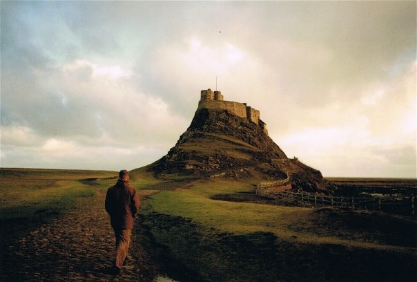 Among Michael's travels is a visit to Holy Island, or Lindisfarne, in Northumbria, a place significant for its role as an early center of Christianity, its Viking history, and its natural beauty.