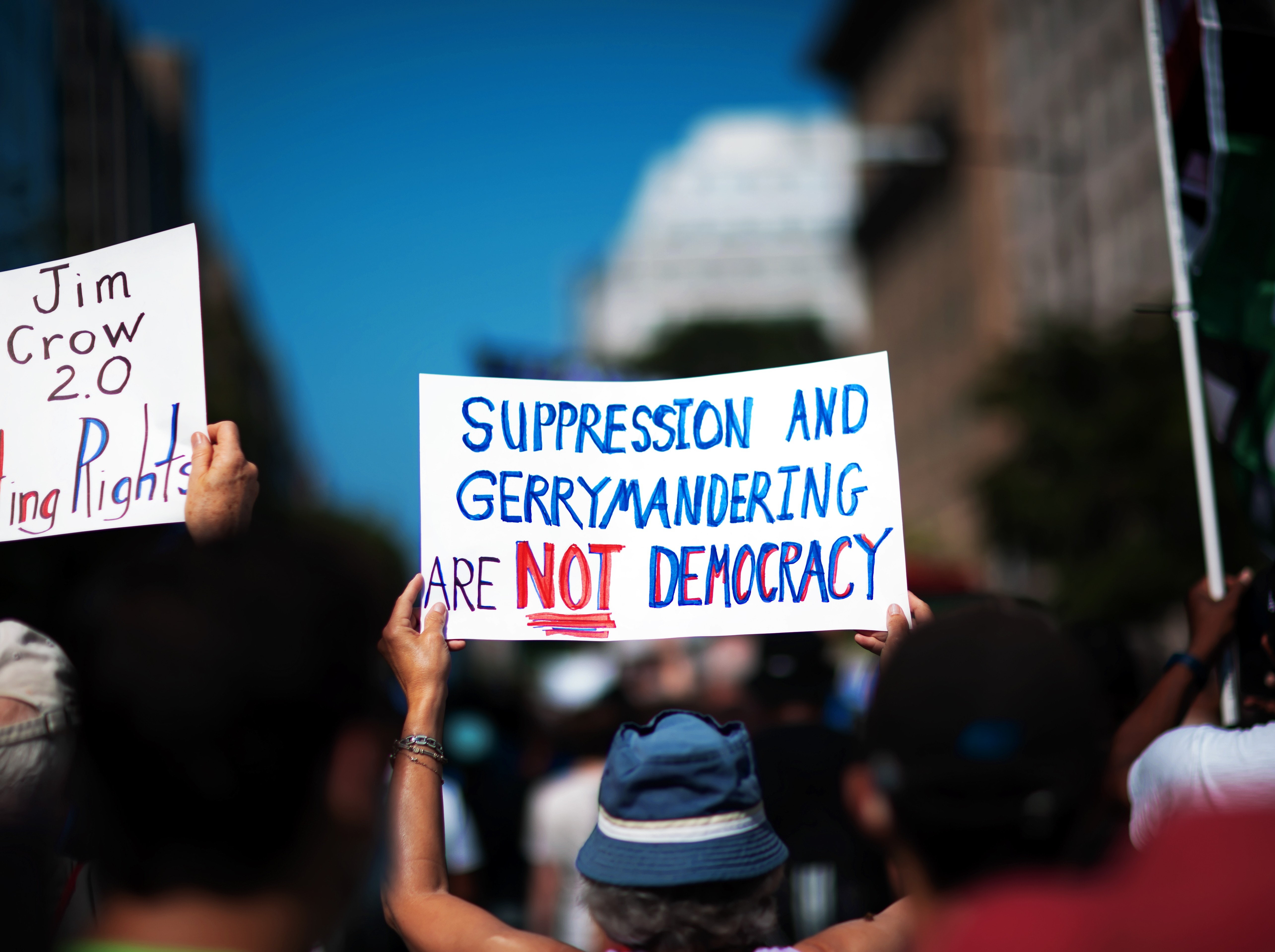 2026-06-30 - Weekly Primerus Press - Gerrymandering - Sign: Suppression and Gerrymandering are NOT Democracy