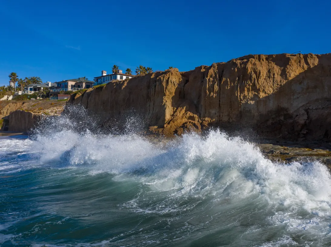 2026 March 10 - Weekly Travelogue - Carlsbad, California - cliff at high tide