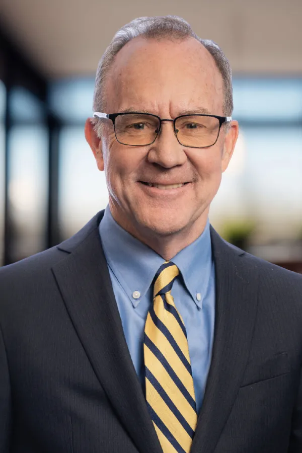 Chuck Adler2_Square_Blurredbg2.png