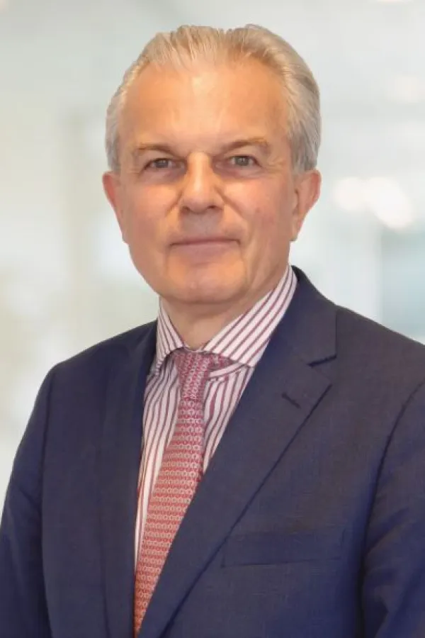 Paul W.L. Russell (Senior Partner)